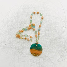 Necklace with multi color petrified opalized wood