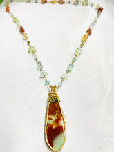 Necklace with colorful opalized agatized wood