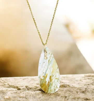 Pendant with white petrified wood from Java