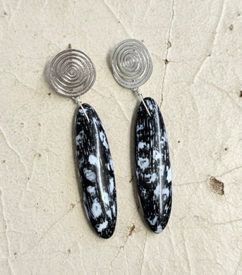 Earrings with petrified palm root