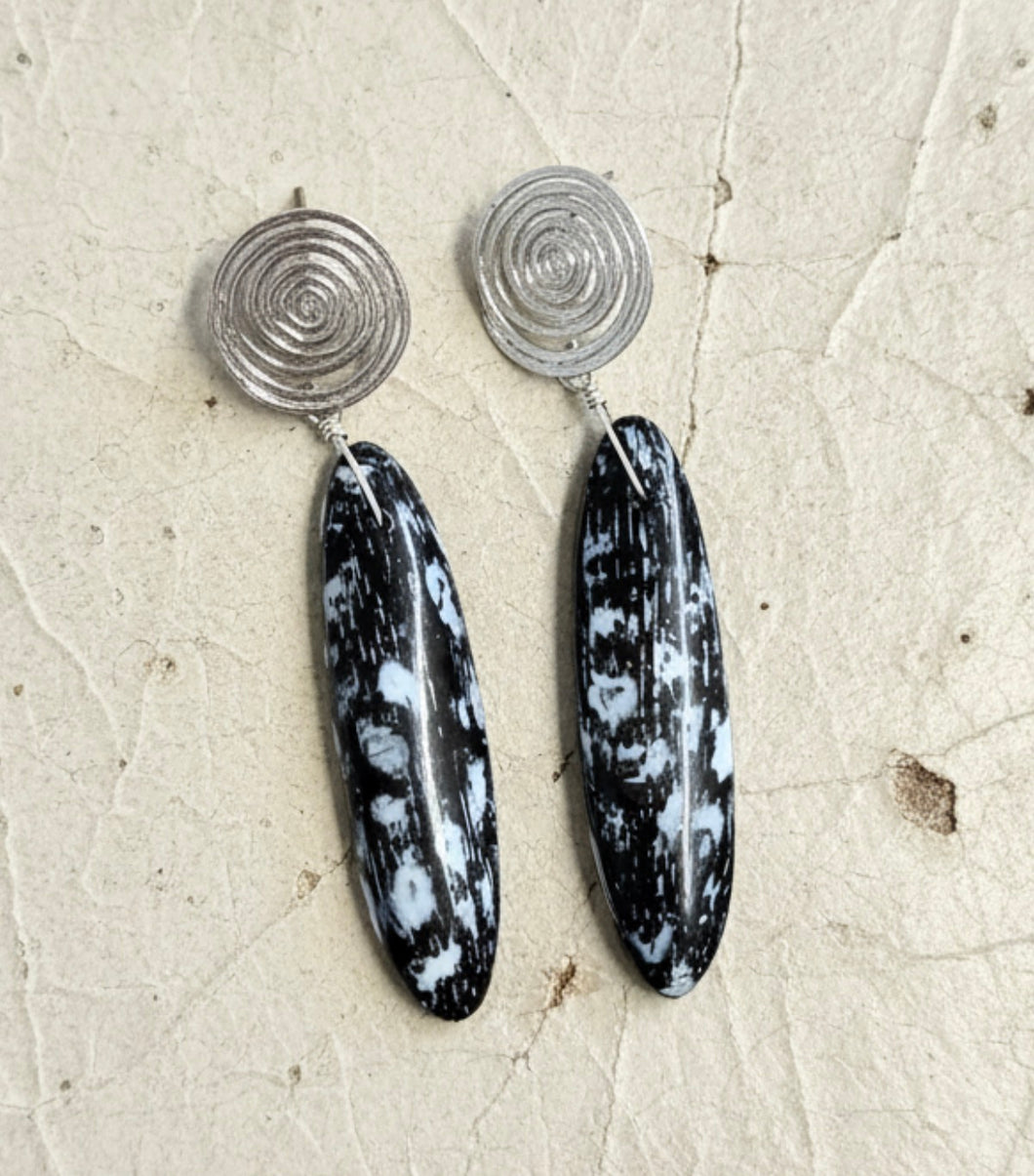 Earrings with petrified palm root