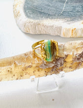 Ring with green brown opalized wood