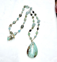Necklace with opal wood and various stones