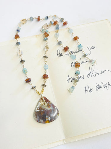 Necklace with dark beautiful opalized petrified wood