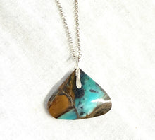 Pendant with natural petrified opalized wood