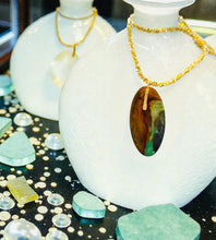 Pendant with silica on petrified wood