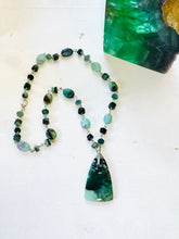 Necklace with deep green colors opalized wood