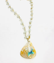 Necklace with drop of opalized wood