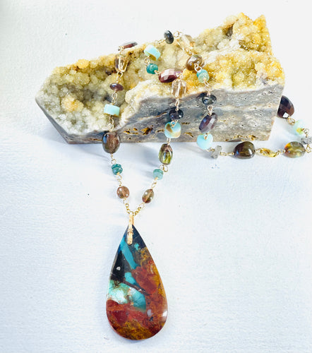 Necklace with dark opalized petrified wood