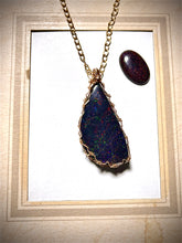 Pendant with black Adamooka opal
