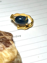 Ring with Ethiopian opal with prongs