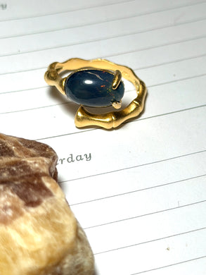 Ring with Ethiopian opal with prongs