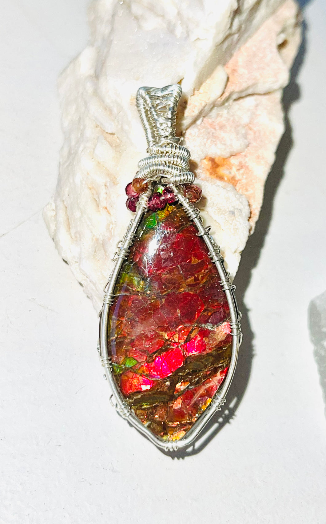 Necklaces with red Ammolite
