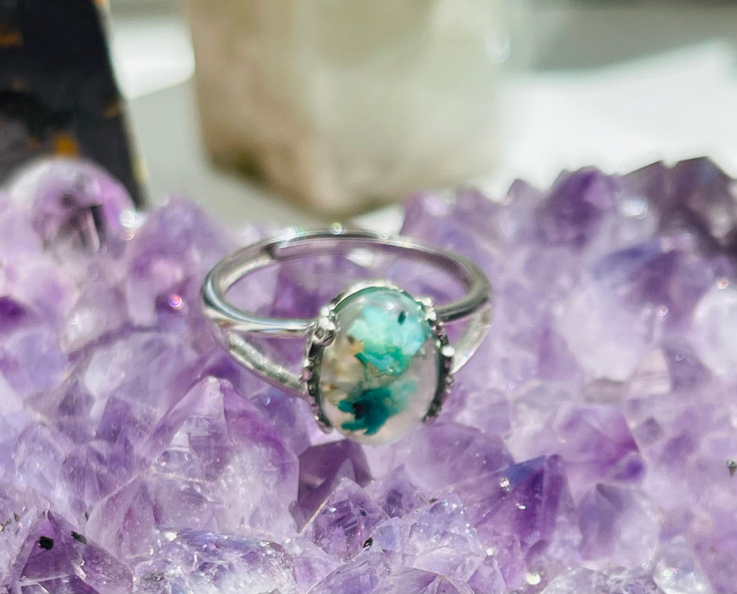 Ring with light blue opalized wood