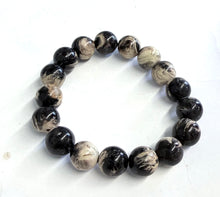 Bracelet with petrified palm root