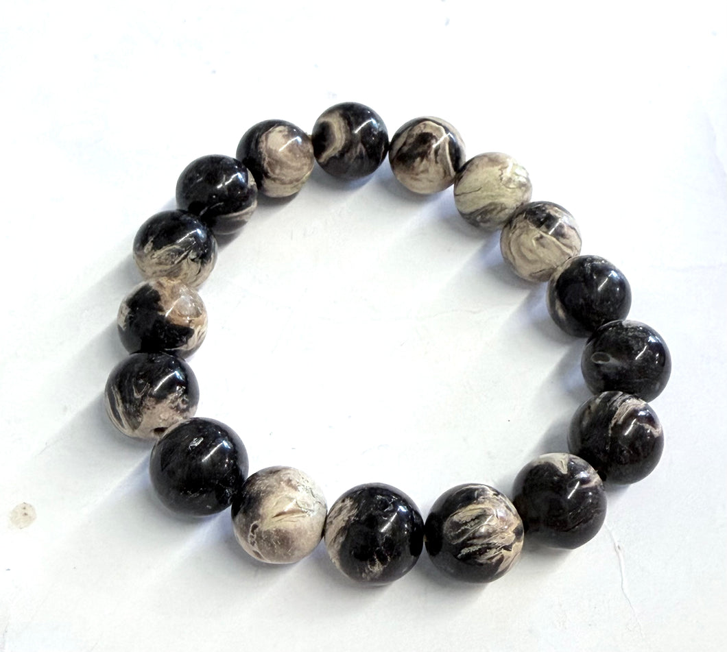 Bracelet with petrified palm root