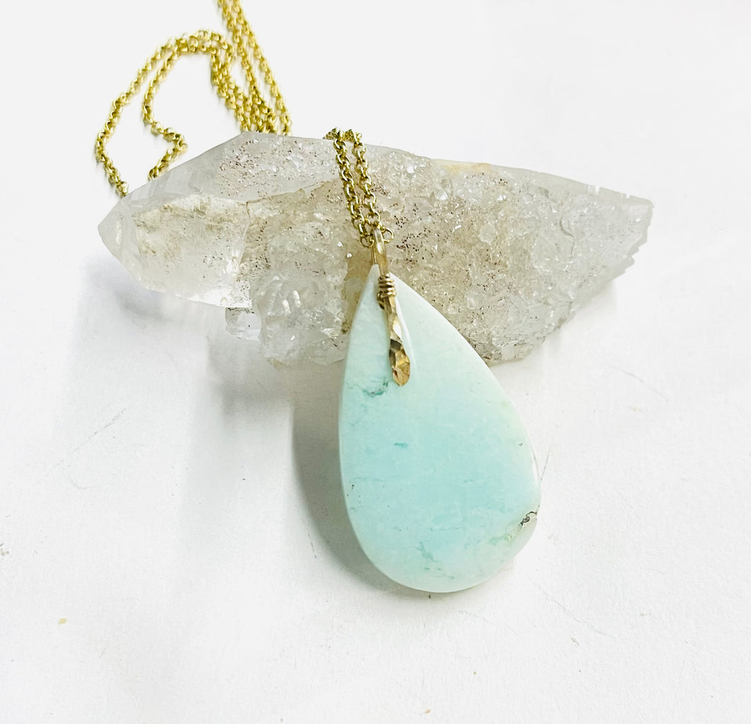 Pendant with long tear drop light color Opalized wood