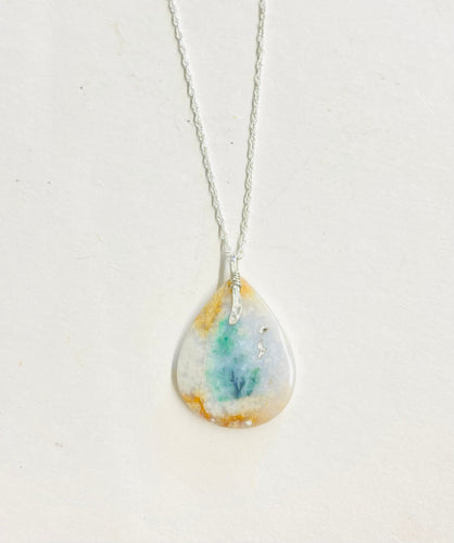 Pendant with natural opalized petrified wood