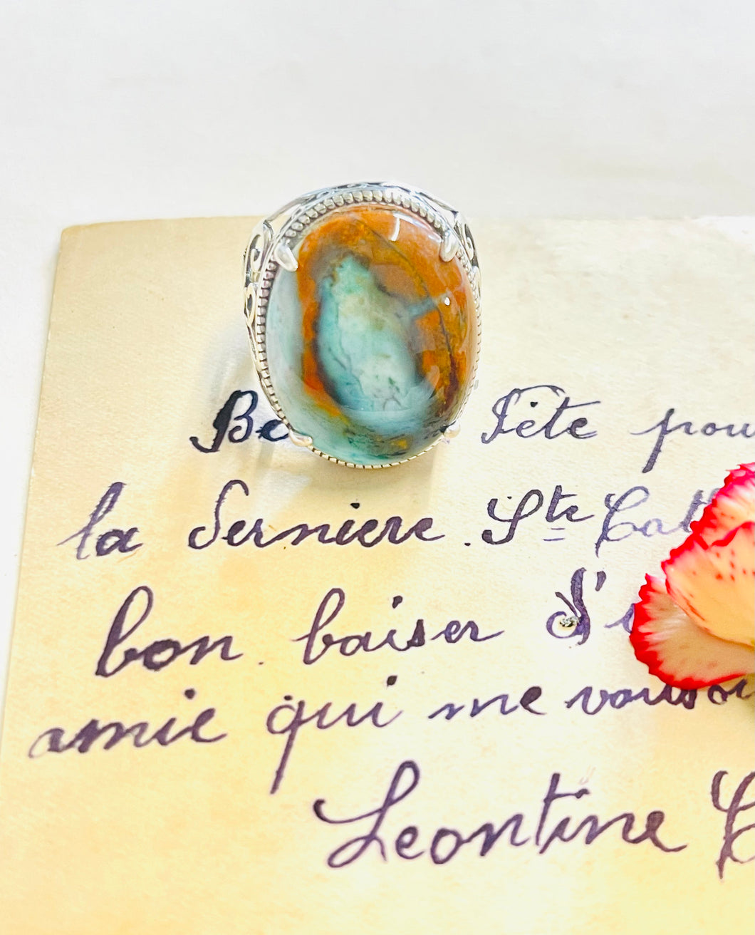 Ring with opalized wood