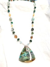 Necklace with opalized wood and various stones