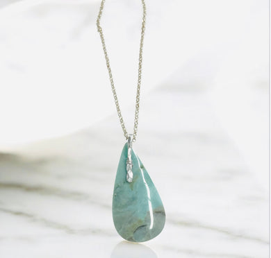 Pendant with opalized wood