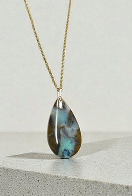 Pendant with agatized opalized wood and natural copper