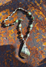 Necklace with opalized wood and various stones
