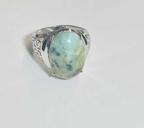 Ring with deep green opalized wood