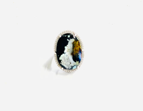 Ring with dark-mustard colors agatized opal wood