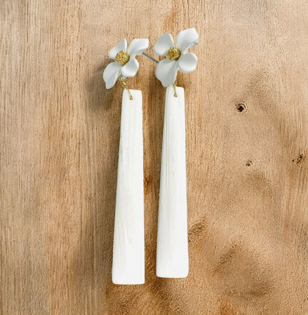 Earrings with floral studs and long scholar-site