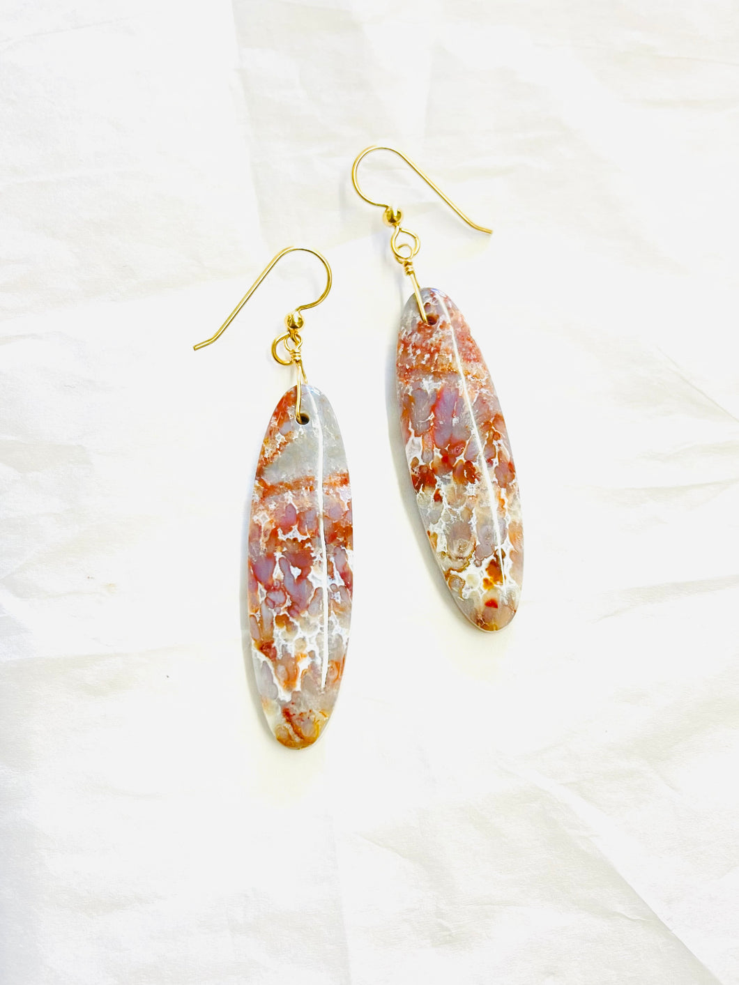 Earrings with red plume agate