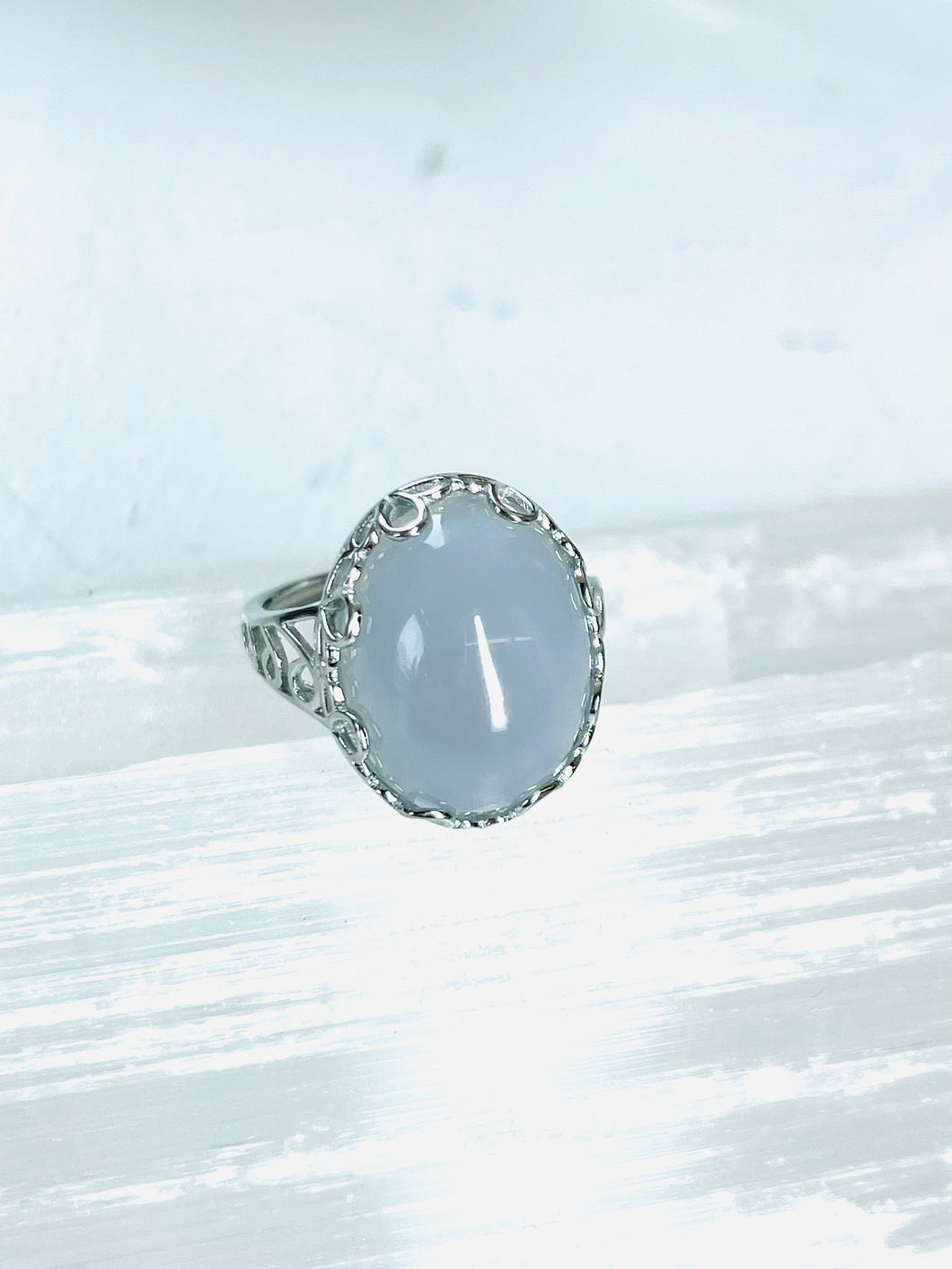 Ring with flashy moonstone bead