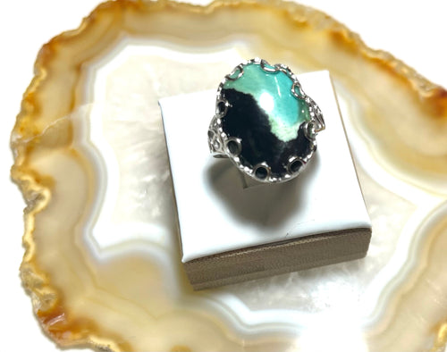Ring with black and grey green opalized wood