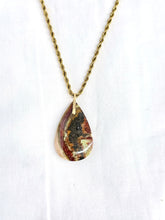 Pendant with opalized wood