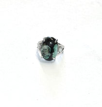 Ring with black blue petrified opalized wood