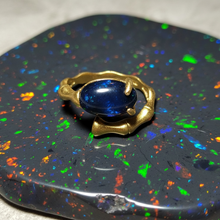Ring with Ethiopian opal with prongs