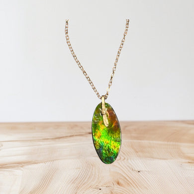 Pendant with green Ammolite