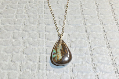 Pendant with koroit opal with purple and brown shades