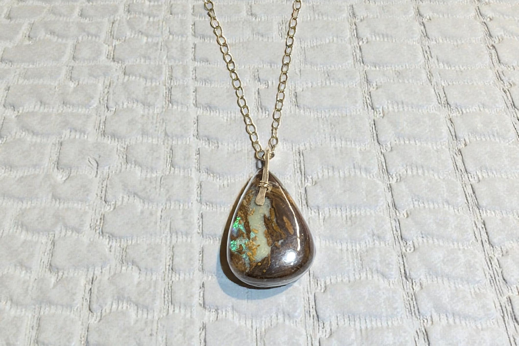 Pendant with koroit opal with purple and brown shades