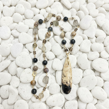 Necklace with petrified palm wood