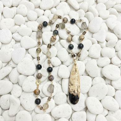 Necklace with petrified palm wood