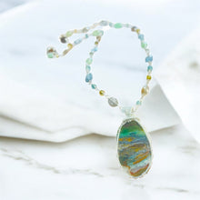 Necklace with copper on opalized wood and various stones