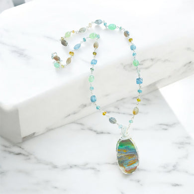 Necklace with copper on opalized wood and various stones