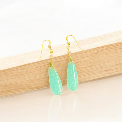 Earrings with blue opal wood