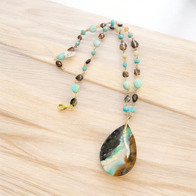 Necklace with dark opalized petrified wood