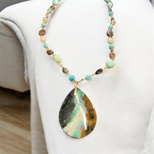 Necklace with dark opalized petrified wood
