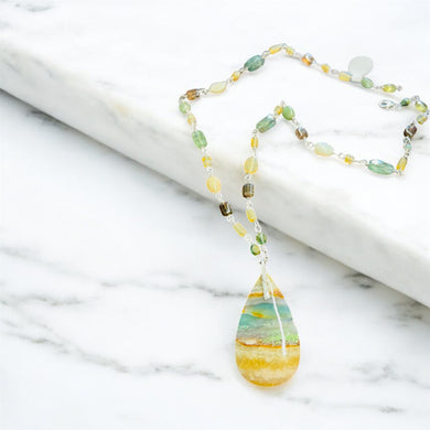 Necklace with natural green beige opalized wood