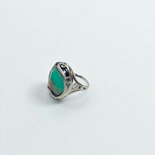 Ring with opalized petrified wood cabochon