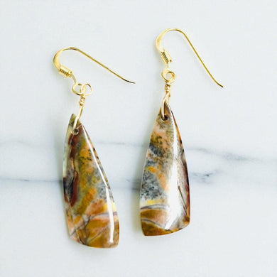 Earrings with red white opalized wood