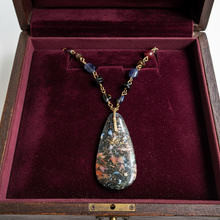 Necklace with agatied coral and various stones